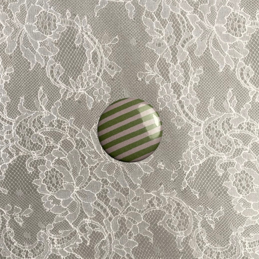 Pink and green stripy small badge