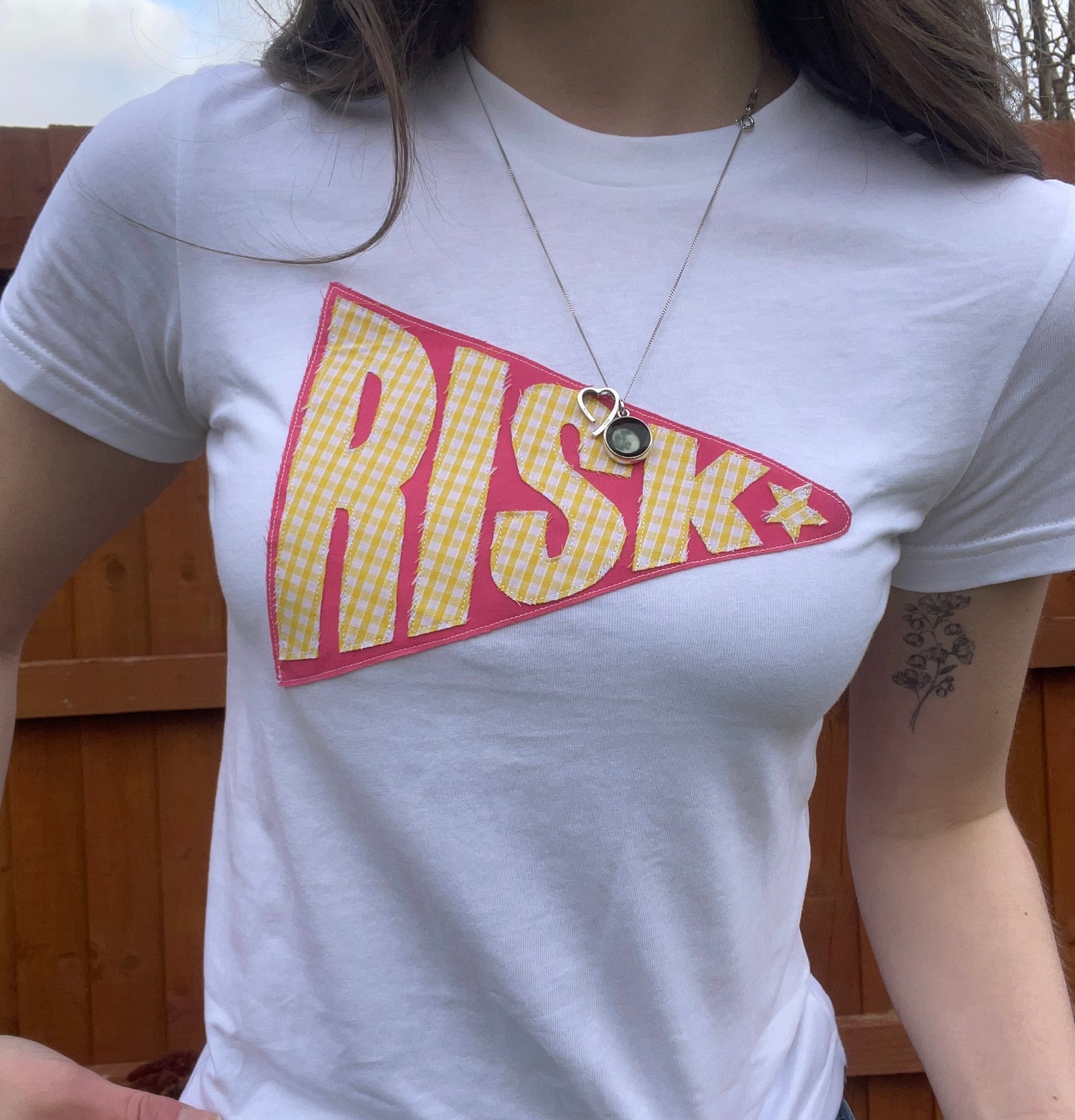Risk baby tee