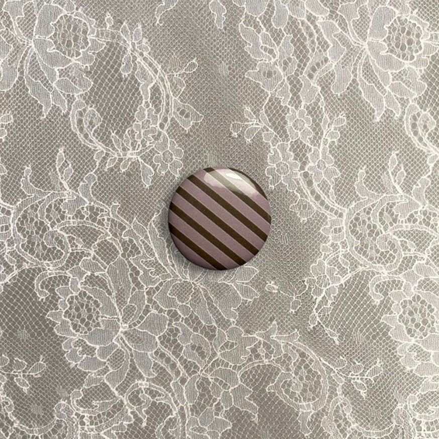 Brown and pink stripy small badge