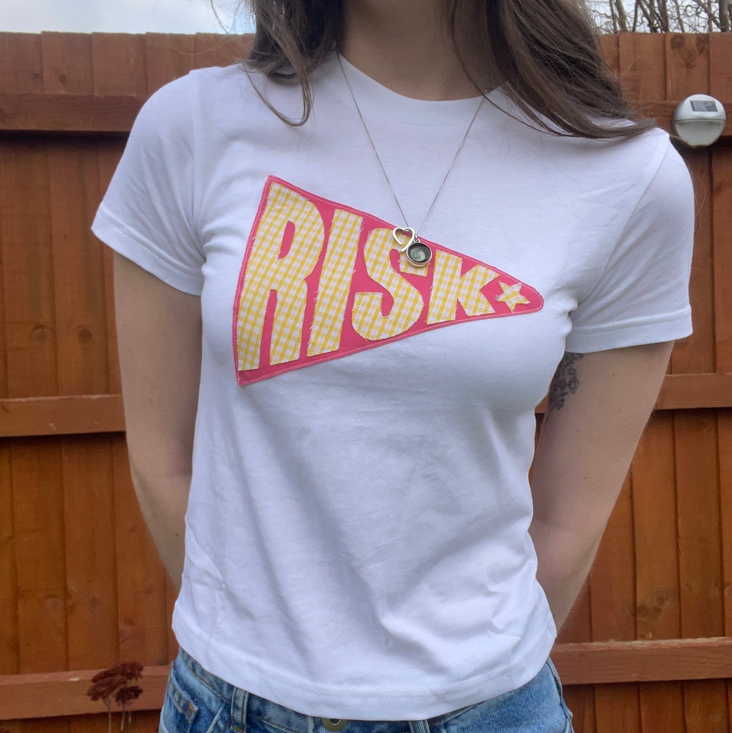 Risk baby tee